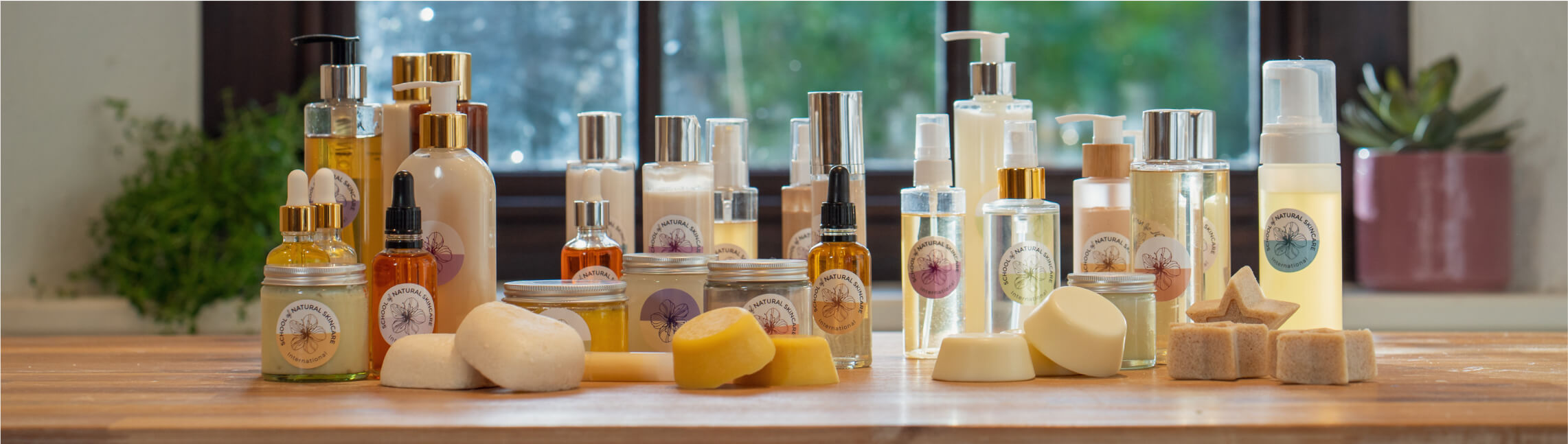 Assorted natural skincare products on wooden table.