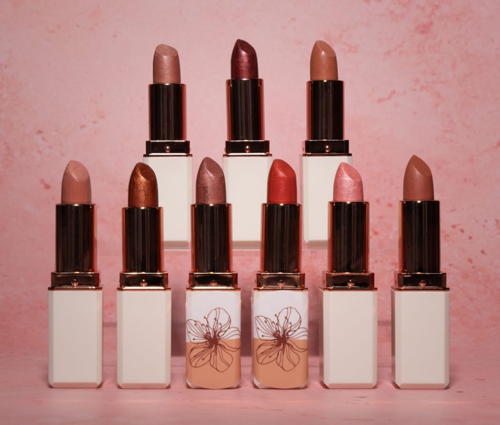 Collection of elegant lipstick shades on display.