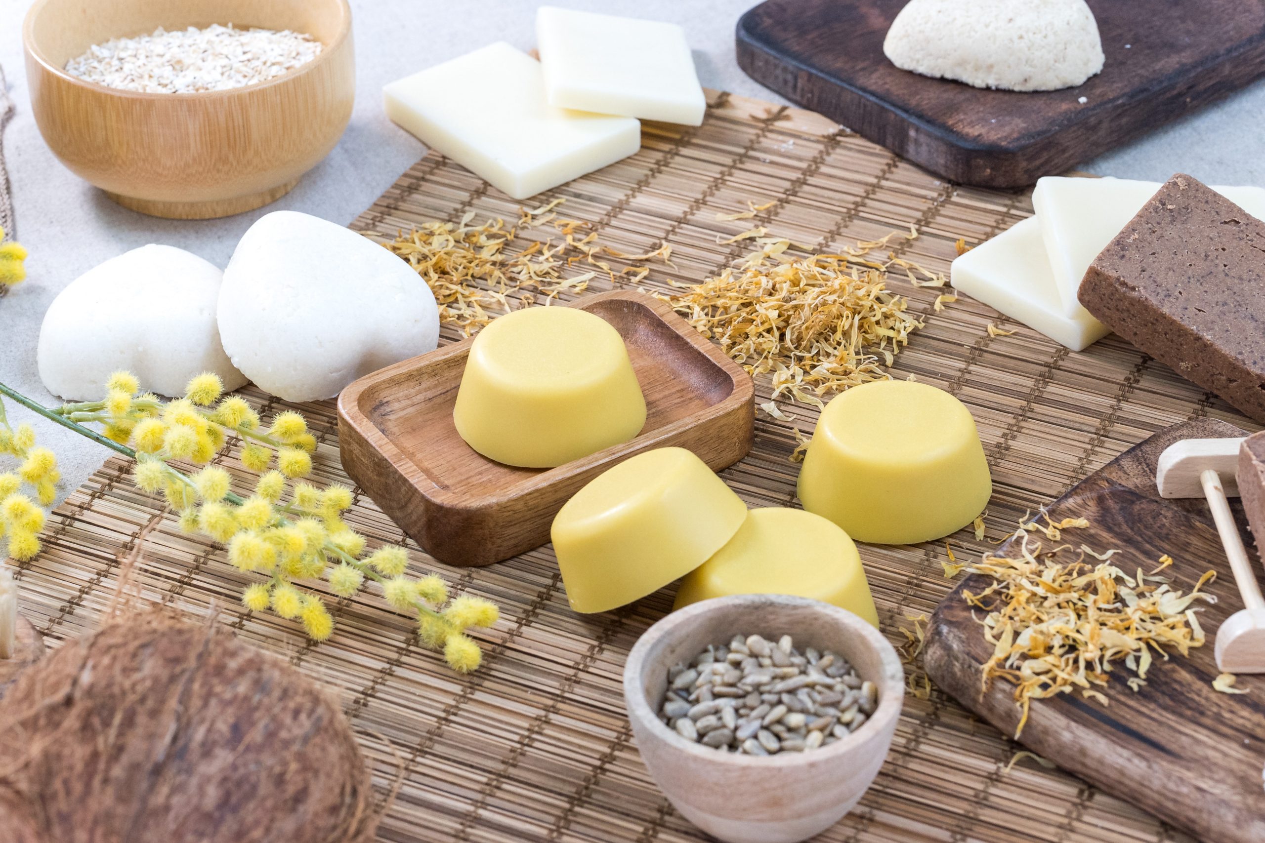 Handmade soap bars with natural ingredients displayed.