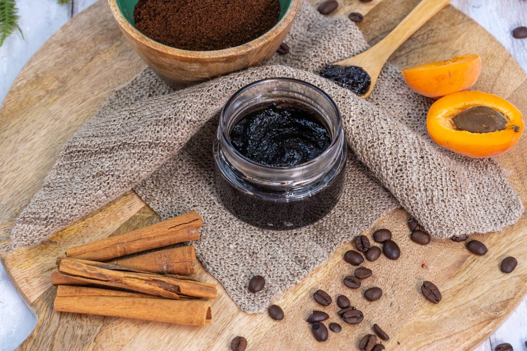 Coffee scrub with apricots and cinnamon on tray.