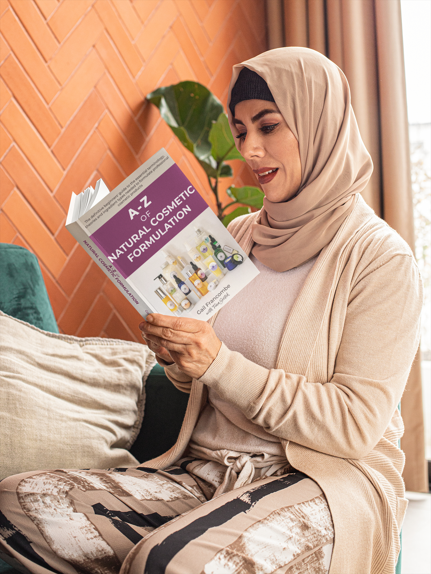 Woman reading a cosmetic formulation book.