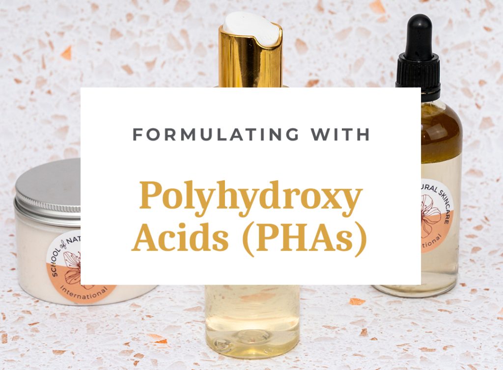 Skincare products with polyhydroxy acids displayed on table.